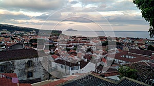 Angra do Heroismo, eastern part of the town, view at sunset, with Cabras islets on the horizon, Terceira, Azores, Portugal photo