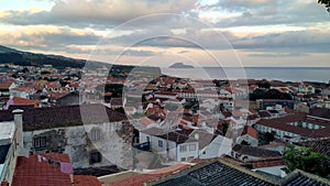 Angra do Heroismo, eastern part of the town, view at sunset from the Outeiro da Memoria point, Terceira, Azores, Portugal photo