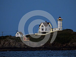 Eastern Point Lighthouse lit up in Gloucester Harbor Massachusetts