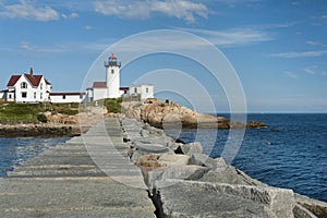 Eastern Point Lighthouse View from Jetty, in Gloucester, Massachusetts photo