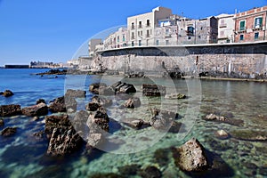 The Eastern rocky coast of Ortigia Island, Syracuse, Sicily, Italy