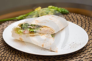 Eastern roll pita with vegetables, meat. Eastern quisine photo