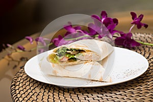 Eastern roll pita with vegetables, meat. Eastern quisine photo