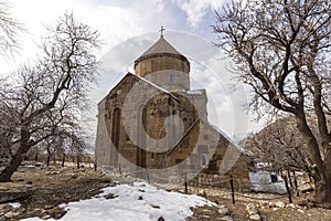 Eastern side of medieval Armenian Cathedral of Holy Cross its bas reliefs, Akdamar island, Van Lake, GevaÃÅ¸ Turkey. Church is photo