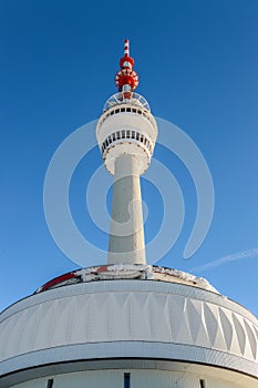 Eastern Sudetes, Praded Relay station on the top of the mountain, against the blue sky