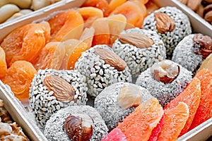 Eastern sweets dried fruits and nuts in a wooden box. Background. Healthy vegan food. Natural food