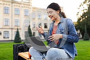 Eastern Woman Student Video Calling Via Laptop Having Virtual Lecture