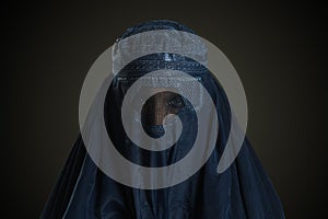 Eastern woman wearing the burqa photo