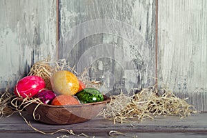 Easters egg in wooden dish