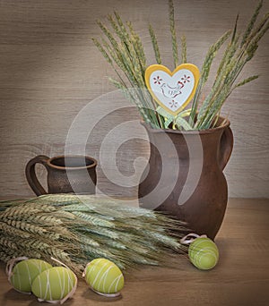 Easters still life from painted eggs and clayware.