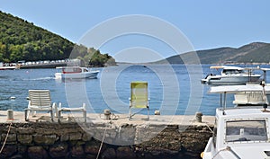 Easy chair on a sea dock