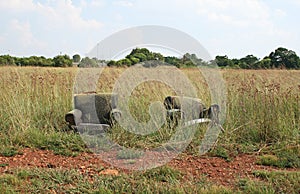 EASY CHAIRS ABANDONED IN THE VELD