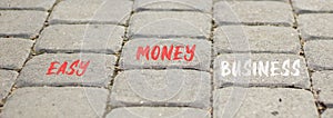 Easy money business symbol. Concept words Easy money business on beautiful grey paving slabs. Beautiful grey paving slabs