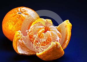 Easy peel orange, open with segments