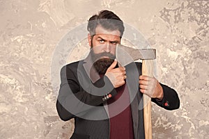 Easy way to style his moustache. Brutal hipster hold axe. Bearded man with stylish moustache. Moustache shaving with