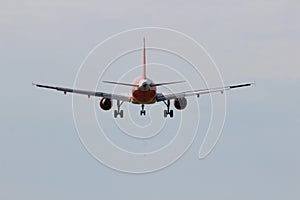 Easyjet Airbus aircraft landing on the landing strip of Amsterdam Schiphol Airport