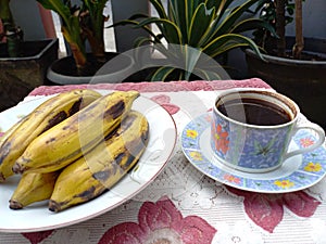 Eat Boiled Uli Bananas and Drink Bitter Coffee During The Day in Rawalumbu of Bekasi, Indonesia