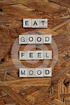 eat good feel mood text in wooden square, motivation quotes.