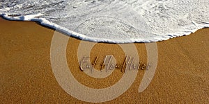 Eat healthier sand lettering new year resolution text photo