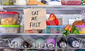 Eat Me First handmade sign in fridge, eat food first shelf to help reduce food waste