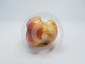 Eaten apple core on white backround