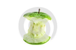 An eaten green apple core