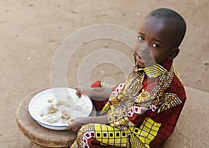 Eating in Africa - Little Black Boy Hunger Symbol