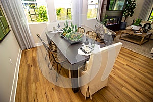 Eating Area With Wooden Table With Centerpiece