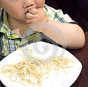 Eating baby to grab pasta photo