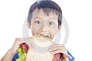 Eating big sandwich
