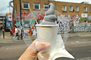 Eating black ice cream with charcoal in Shoreditch, East London