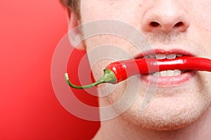 Eating chili pepper