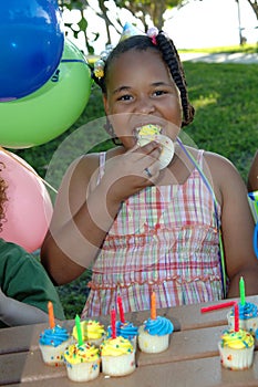 Eating cupcake birthday party