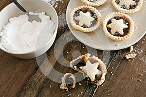 Eating delicious fresh baked Christmas mince pies
