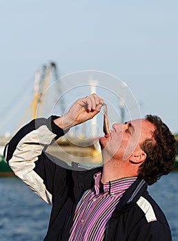 Eating dutch herring