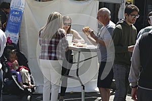 Eating fast food at  the 50th Annual University District Street Fair