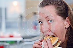 Eating hamburger photo