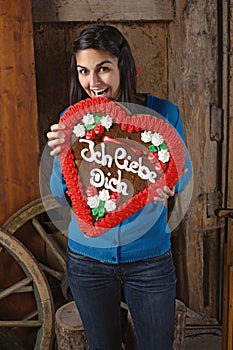 Eating a huge heart cookie