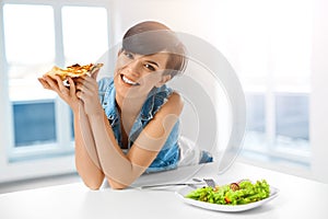 Eating Italian Food. Woman Eating Pizza. Fast Food Nutrition. Li