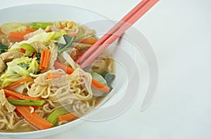 Eating noodle and clear soup vegetarian