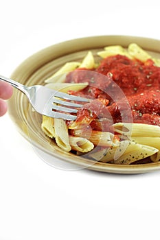Eating pasta with fork