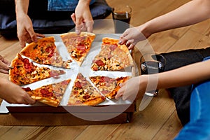 Eating Pizza. Group Of Friends Sharing Pizza. Fast Food, Leisure