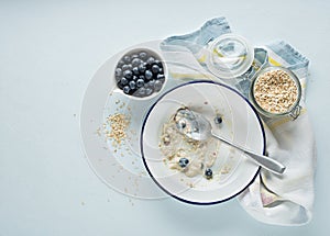 Porridge oatmeal breakfast with fruit photo