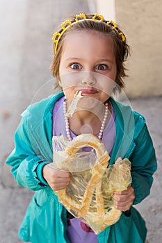 Eating pretzel outdoor