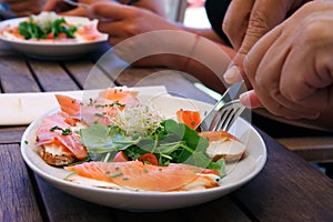 Eating salmon salad