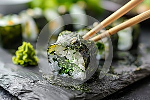 Eating Sushi Rolls with Chopsticks in Hands, Taking Sushi Roll, Eating Susi in Japanese Restaurant