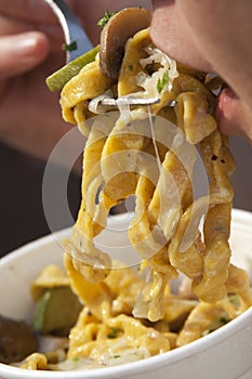 Eating Tagliatelle Pasta