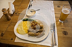 Eating traditional sarmale in `Tears and Saints ` Restaurant, Bucharest