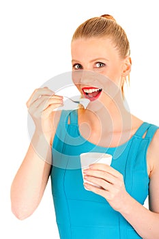 Eating yoghurt woman