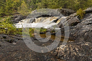 Eau Claire River Waterfall In Autumn